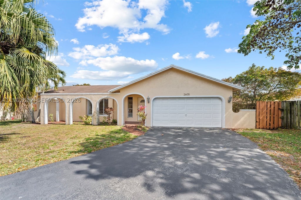 Photo of 2605 NW 98th Ln, Coral Springs, FL 33065 (MLS # A11962502)