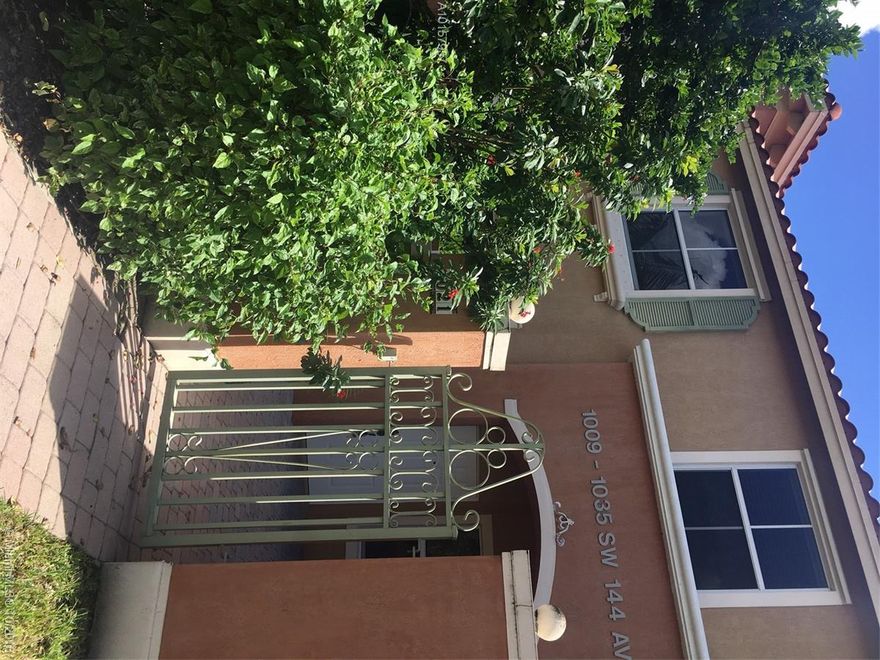 Great Location!  2 bedroom, 2.5 bath townhouse with private courtyard entry. Granite countertops, wood cabinets, stainless steel appliances, tile downstairs, neutral carpet upstairs, nice size family room,  full size washer & dryer. Located within walking distance from Pembroke Gardens Mall.