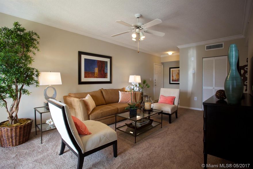 Exquisitely designed & completely renovated 2/2 unit located on 2nd floor with balcony overlooking the natural preserve/waterview. This is a model unit.  All white appliances are new, never been used.  Fully equipped w/carpeting throughout and vinyl flooring in kitchen/bathrooms. Spacious bedrooms with Split floor plan and walk-in closets. Garden style tubs in both bathrooms. Washer/dryer included.  Unit building is located next to clubhouse and other amenities.  Includes 1 assigned parking space. Amenities: resort style pool, fully equipped fitness center, indoor raquetball court, children's playground, BBQ area, etc. Unit is currently vacant.
