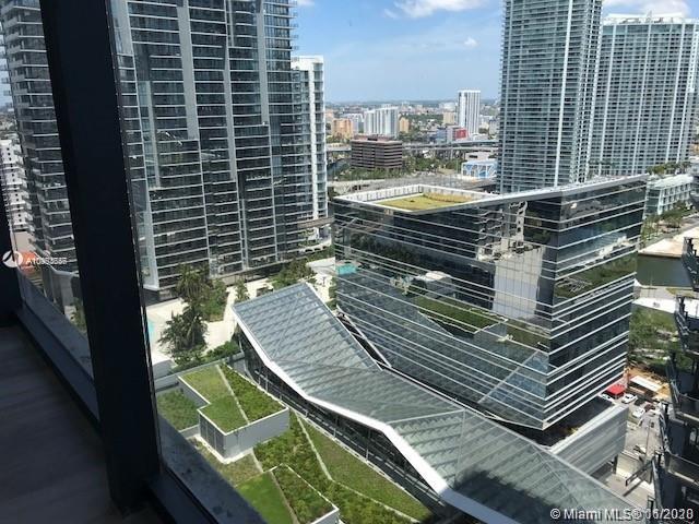Enjoy living at sophisticated SLS LUX Brickell in this functional 1 Bedroom + DEN and 2 Bathroom condo featuring Wood Tile floors throughout, European kitchen cabinets, luxury appliances, modern bathrooms, spacious closet, electric shades and blackouts and private foyer. SLS LUX with great amenities: fitness room, lap pool, BBQ grills, a beautiful party room and game room, kids' room, outdoor work out station, spa with Steam Room, treatment rooms, and soon to be opened 45th Floor with Swimming pool, jacuzzi and more. Unit comes with 1 Complimentary Valet Space.