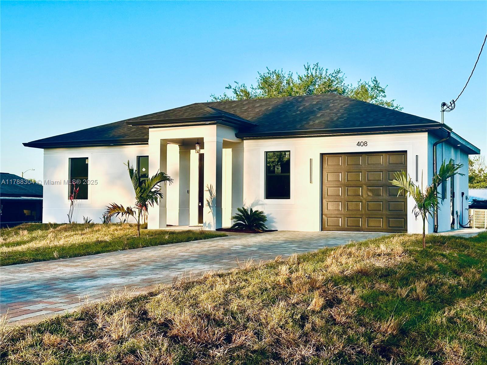 408 Alabama Rd S Rd, Lehigh Acres, Lee County, Florida - 3 Bedrooms  
2 Bathrooms - 