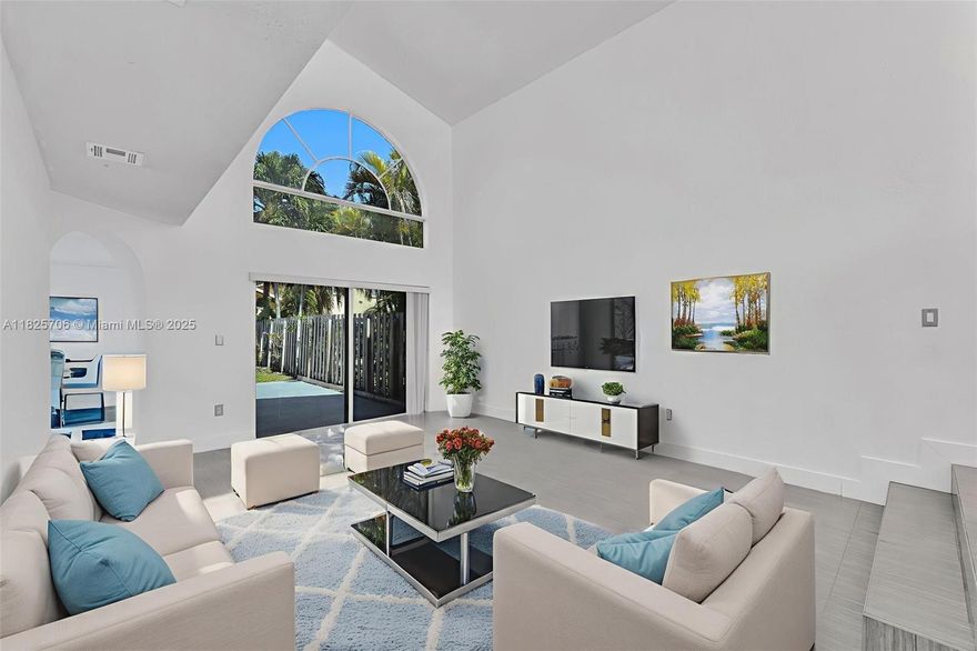 A Rare Opportunity in Doral’s Private Oasis. Experience living in this remarkable home, quietly nestled Dead end Street within a gated community offering 24/7 security. This elegant residence exudes the warmth and character of classic Spanish-style architecture. The open-concept first-floor layout is perfect for welcoming guests  for entertaining and everyday living. Step outside to a spacious, sun-drenched patio, where you can savor peaceful mornings and evenings surrounded by nature. Here, luxury meets comfort in a setting designed to inspire memorable moments . Whether you're hosting lively gatherings or enjoying quiet family time, this home provides the ideal backdrop for a life well lived. Don’t let this hidden gem slip away—your dream lifestyle in Doral is waiting.