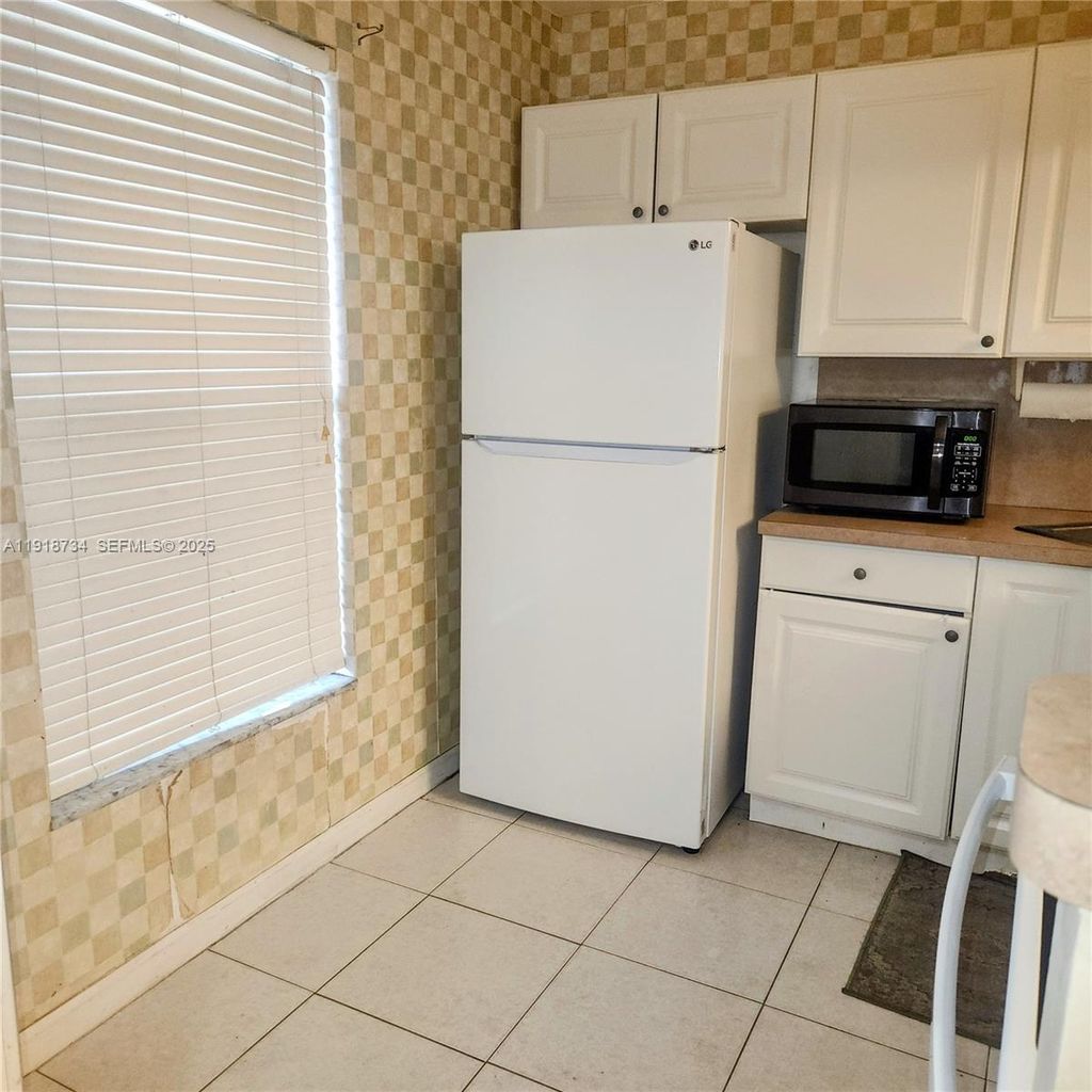 Photo of 5800 NW 64th Ave #108, Tamarac, FL 33319 (MLS # A11918734)