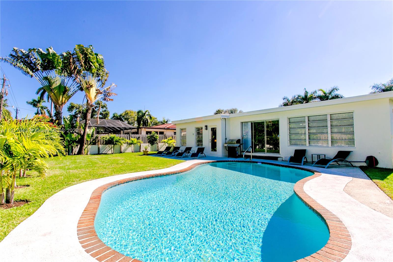 This is a short term Monthly/Weekly Rental.
Monthly rate $8,999.
Renovated and Spacious 4 Bedrooms / 6 Beds Home with heated pool, BBQ, and spacious backyard, located on one of the best blocks in Hollywood Lakes.
Minutes from the Beach, Hollywood Boardwalk, Restaurants, Bars, Casinos, and more.