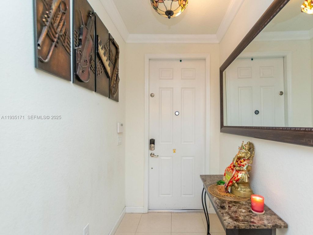 Photo of 12320 S Village Cir #12320, Davie, FL 33325 (MLS # A11935171)