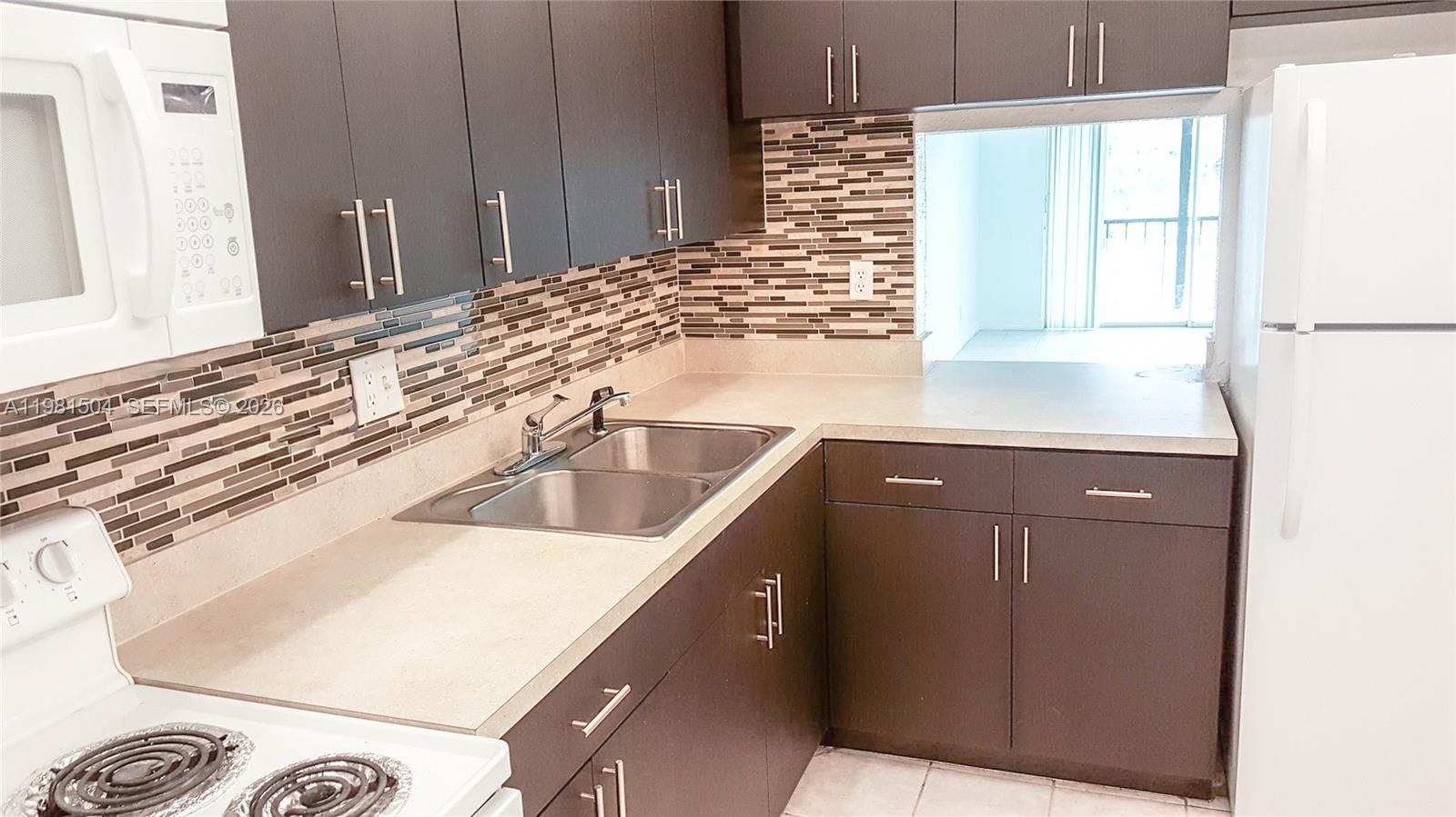 VERSAILLES GARDENS CONDO - Residential