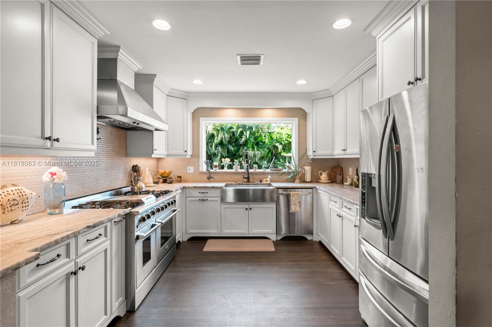 Discover this beautifully updated 3bed 2bath + 1 car garage home in the heart of Plantation. Full of charm & modern upgrades, it features original Miami pine hardwood floors, crown molding, custom kitchen cabinets with granite countertops & a professional NXR gas range. Roof & plumbing under 5 yrs old (PVC & copper), A/C 2017, impact windows & doors, & a hurricane-rated garage door. Septic serviced in 2024. Additional room ideal for an office/den. Upgraded electric, plus a money-saving irrigation system that runs off a private well. Fenced yard, new sod front & back, paver-lined driveway & walkways. Located in desirable Ft. Lauderdale Country Club—just 10 mins to downtown, beach, airport, with easy access to major highways. Near A/B schools, parks & shopping in a luscious neighborhood!!