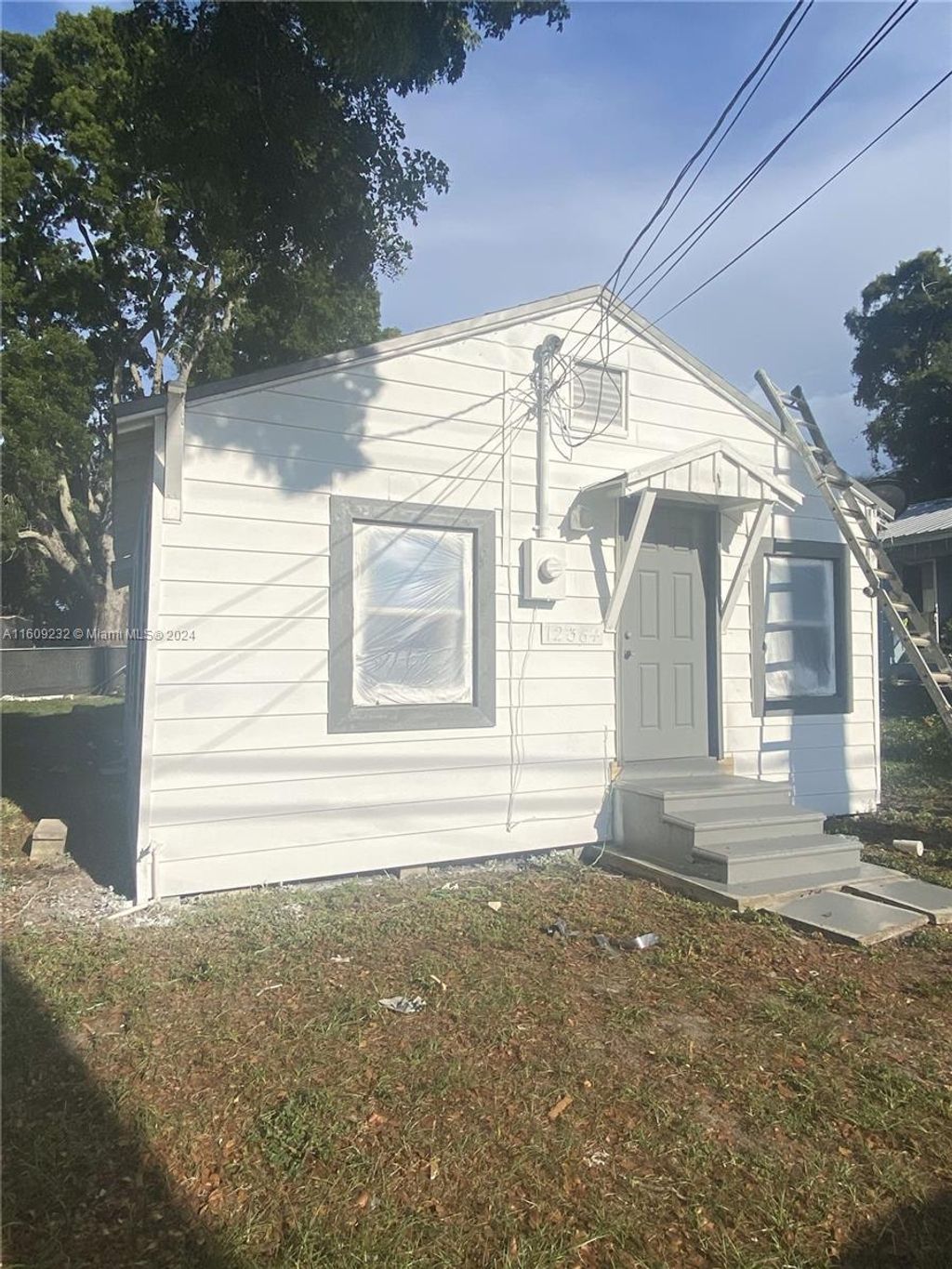 Photo of 12364 Lakeshore Dr #12364, Canal Point, FL 33438 (MLS # A11609232)