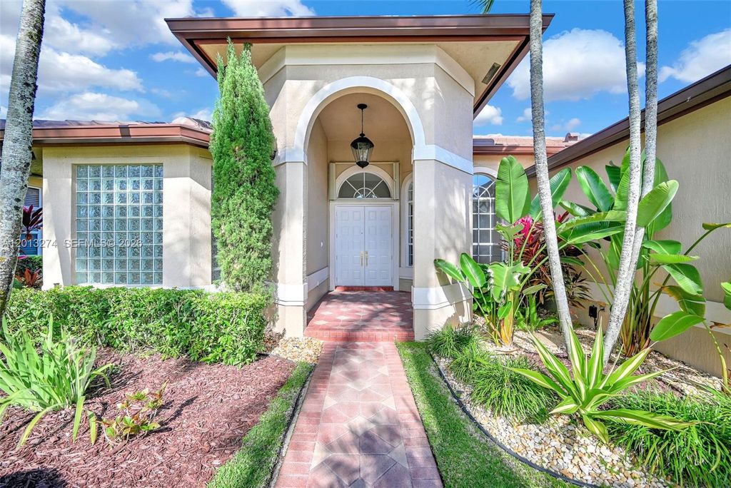 Photo of 2553 Jardin Mnr, Weston, FL 33327 (MLS # A12013274)