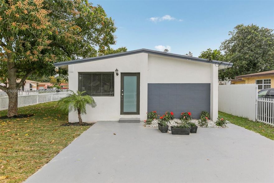 Welcome to this beautifully updated home in the heart of North Miami Beach! Property blends modern upgrades with timeless charm, offering the perfect space for comfortable living. Featuring 3 bedrooms and 2 bathrooms, this home boasts an open-concept layout with abundant natural light, sleek parquet wood flooring, and stylish finishes throughout. Step outside to a beautifully landscaped backyard, ideal for relaxing or hosting gatherings. Additional highlights include impact windows and doors, updated plumbing and electrical systems, 2018 roof, and a spacious driveway. Located in a prime North Miami Beach neighborhood, this home is just minutes from sunny beaches, Aventura Mall, top-rated schools, dining, and major highways.