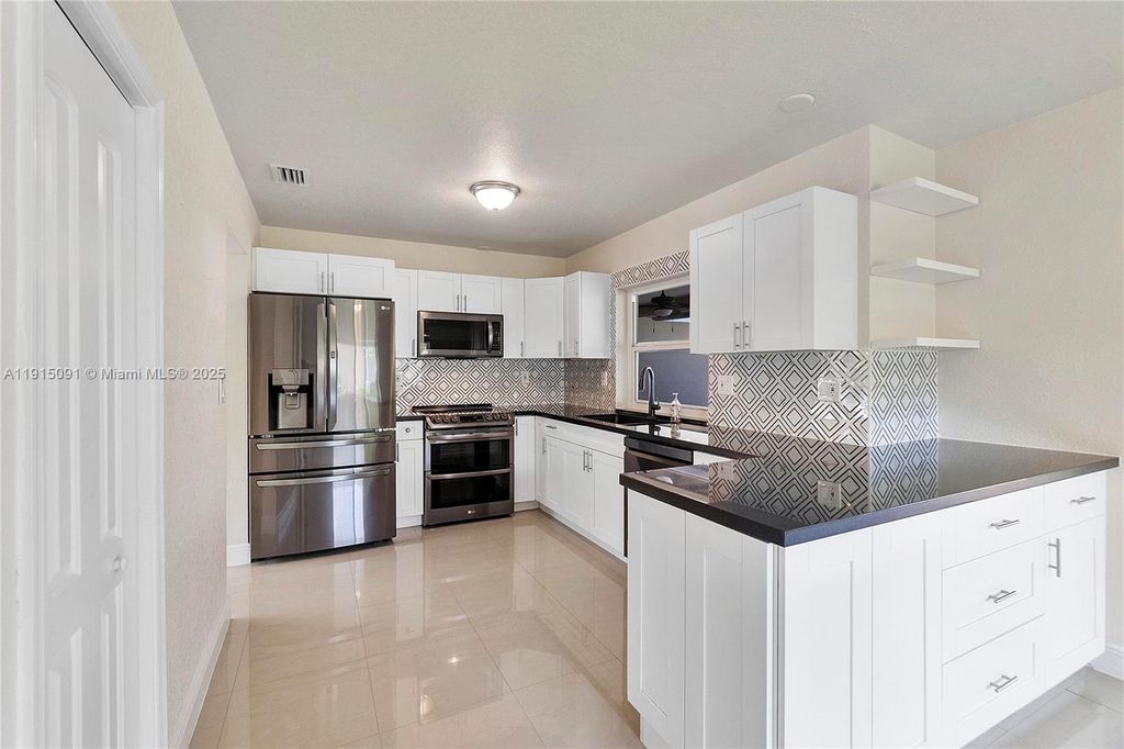 Photo of 3880 Coral Hills Dr, Coral Springs, FL 33065 (MLS # A11915091)