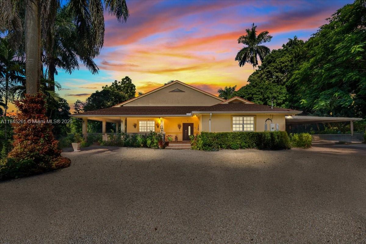 Experience Redland living in this 3BR/2BA estate on a 27,007 SF lot, fully furnished with solid wood pieces from around the world. Built in 2002 with a new roof and pool pump, this CBS home offers volume ceilings, formal dining, and a cozy wood-burning fireplace. The primary suite features a sitting area, walk-in closets, and spa bath with whirlpool tub. Enjoy a gourmet kitchen with pantry and wall oven, plus French doors leading to a backyard oasis with heated 16x40 pool/spa, outdoor kitchen, wraparound porch, mature fruit trees, and chicken coop. Extras include RV/boat parking, detached shed, hurricane protection, no HOA, well water, and septic, just minutes from shopping, dining, major roadways, and the best of Redland’s countryside charm.