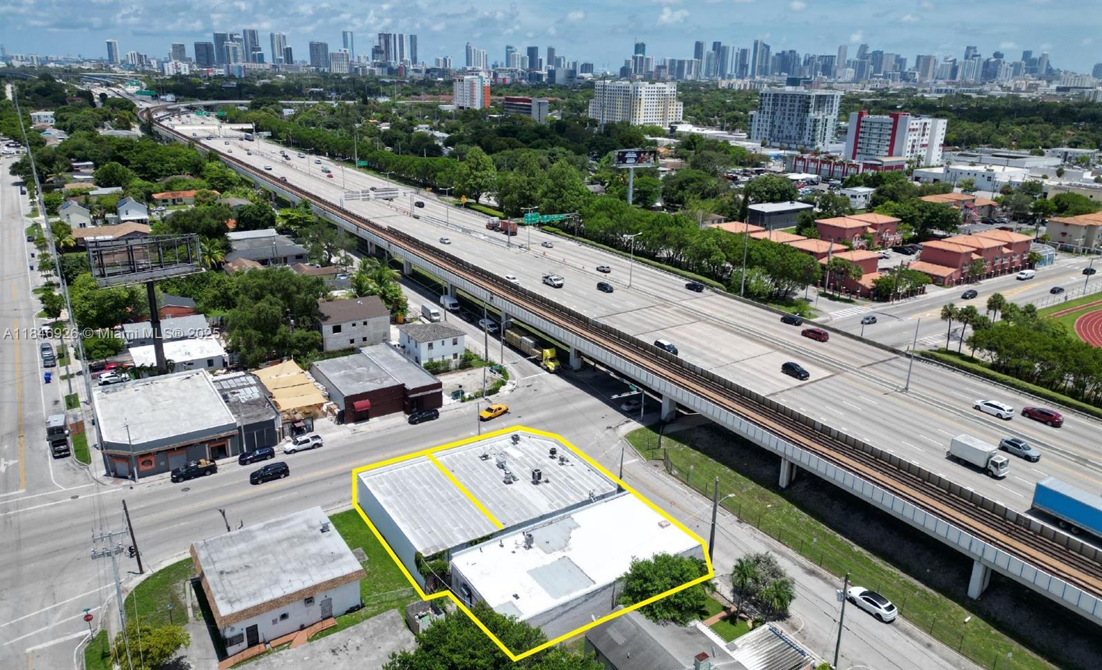 Presenting 4000 NW 17th Avenue — a centrally located mixed-use property in North Allapattah, just minutes from Miami International Airport with direct access to the 112 Expressway. This 8,096 SF building sits on a 9,350 SF lot and offers a versatile mix of retail, flex, and warehouse space. Current income includes a tenant paying $4,500/month NNN with 3% annual increases through 2034. Additional space is available for lease or owner occupancy, including a partially built-out unit with an approved master permit for restaurant/bar use. Ideal value-add opportunity.