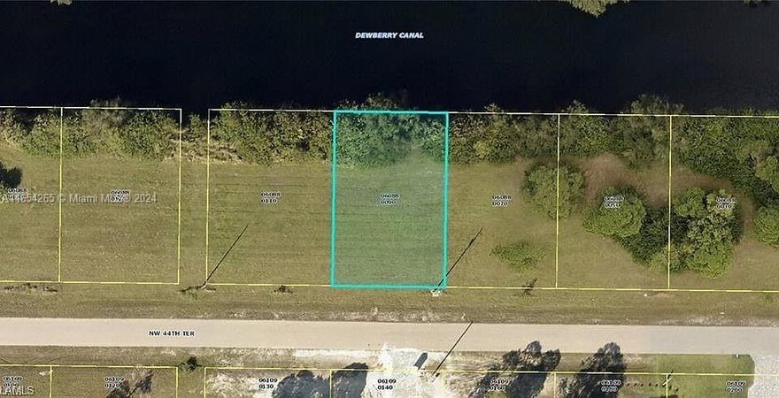 READY TO BUILD + Waterfront lot located in NW Cape Coral! This fantastic location provides ease of access to all that Cape Coral and Punta Gorda have to offer. World class beaches, shopping, dining, golf and boating are all available. Build your dream home and sit back, relax while taking in the water view from your own backyard! Do not miss this opportunity!!