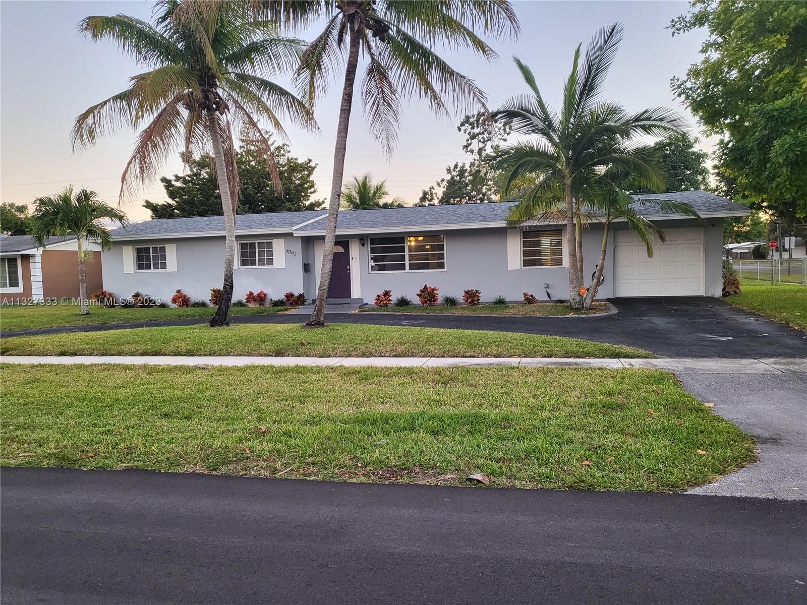 Photo 2 of 31 of 4792 NW 3rd St house