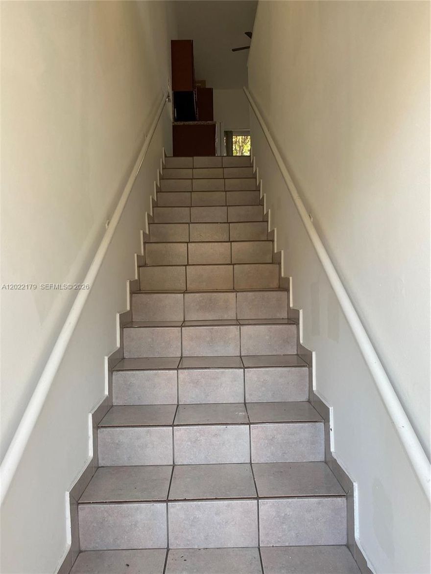 Beautiful 3-bedroom, 2-bathroom apartment in an excellent location just minutes from the Palmetto Expressway. Featuring ceramic floors throughout, spacious living areas, and a wood kitchen with granite countertops. Very bright unit, freshly painted, and ideal for investors — currently rented. Laundry inside the unit and 2 assigned parking spaces. Great investment opportunity!