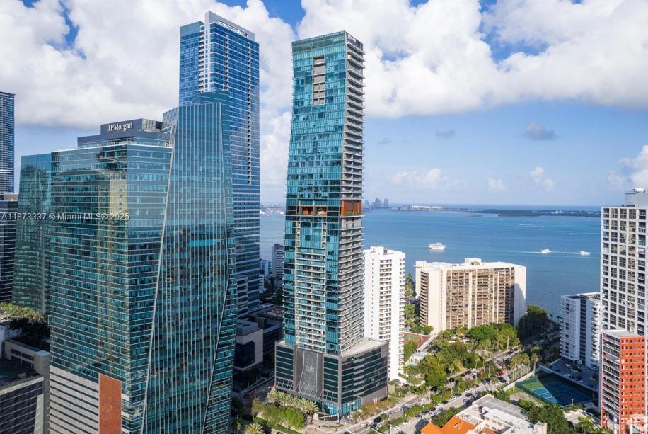 Experience refined luxury living at Echo, the most Exclusive boutique residential High-rise in Brickell! This corner, 1-B/1.5-B, full-floor residence boasts high ceilings, floor-to-ceiling windows, custom-built walk-in closet, Marble floors, Italian glass cabinetry, & a gourmet kitchen with top of the line Wolf and Bosch Appliances. The open-concept layout flows seamlessly to a private balcony with built-in Summer Kitchen, perfect for indoor-outdoor entertaining while enjoying beautiful views of Downtown Miami & Biscayne Bay
Some amenities & services include a panoramic infinity-edge pool with poolside service, private theater room, business/coworking lounges, resident lounges, Pet Walking & valet services. Prime location: walkable to shops, restaurants, Brickell City Centre, and more.