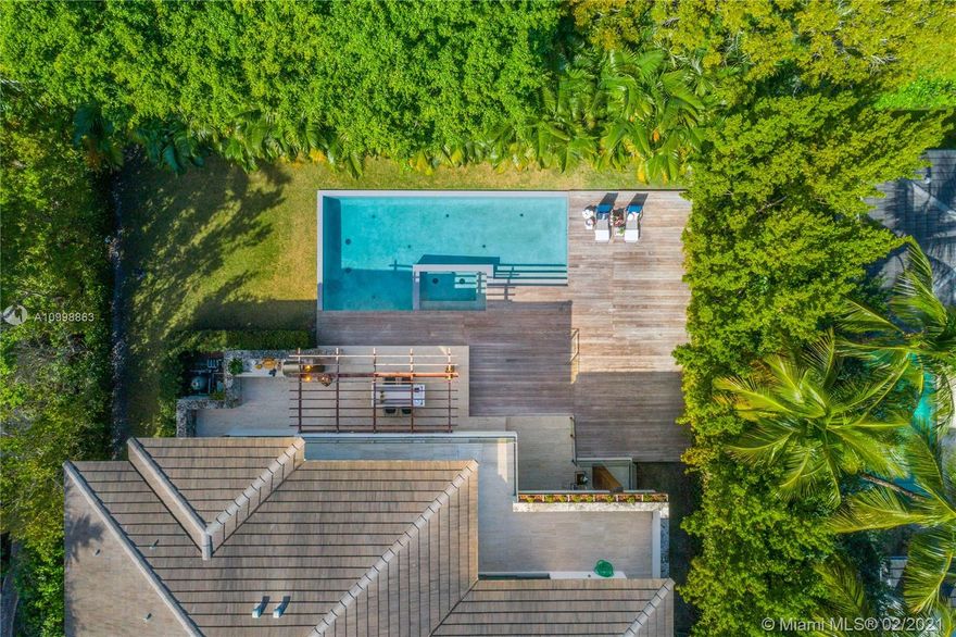 Raise with the sunlight filling up your home, from bedrooms to living spaces, and get that energy to start your day! Have your morning cup of coffee watching the beautiful greenery backyard and poolside. Modern and grand living space opening up to your backyard, porch and pool with jacuzzi, to host your friends for a BBQ in the outdoor kitchen, enjoying sunlight all afternoon in the pool, or enjoy moonlight drinks.  High ceilings welcome you to this luxury living. Super high-end finishes include Record E Cucine, Thermador appliances, Dornbracht and Hansgrohe faucets, Ghizzi & Benatti Italian wood doors. Enough space in the 4-car garage to have your home gym and a home office space for this times of remote home work.