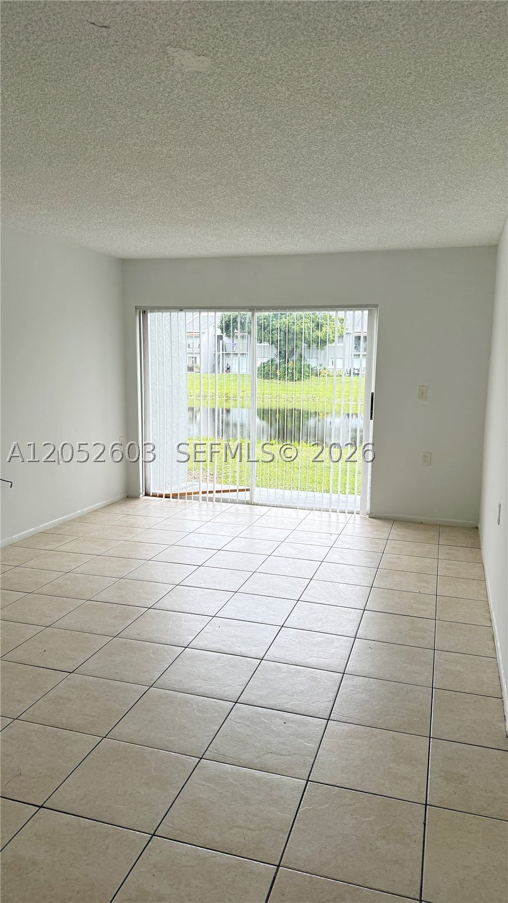 Photo of 1163 Lake Terry Dr #J, West Palm Beach, FL 33411 (MLS # A12052603)