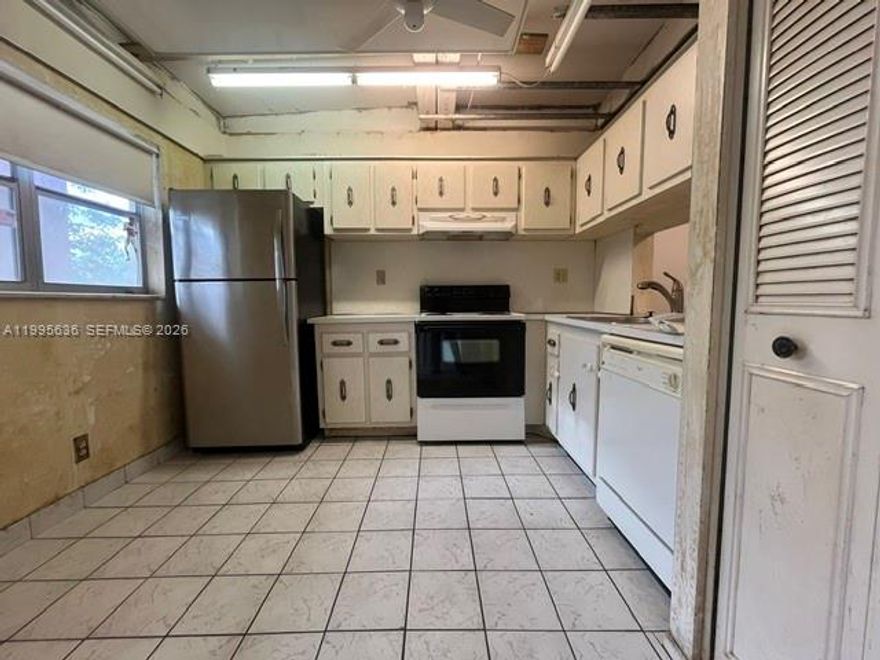 Investor special! Excellent opportunity to own a 1-bedroom, 1.5-bathroom condo in the desirable 55+ community of The Greens in Tamarac. This unit is in original condition and will require full renovation, making it ideal for buyers looking to update and customize the space to their own style.

Priced aggressively for a quick sale, this property offers strong potential for value after renovations. Features include ceramic flooring throughout, a screened balcony, central A/C, and one assigned parking space.

The kitchen includes refrigerator, electric range, microwave, dishwasher, and trash compactor, all in original condition. The half-bath adds convenience for guests, enhancing the layout and functionality of the unit.

Maintenance includes water, sewer, trash removal, pest control interior, parking, hot water, and exterior maintenance, providing convenient living within a well-managed community.

Conveniently located near shopping centers, restaurants, medical facilities, and major roadways.

No leasing allowed. Pets permitted up to 20 lbs. Association approval required. Property sold As-Is and priced to reflect condition.