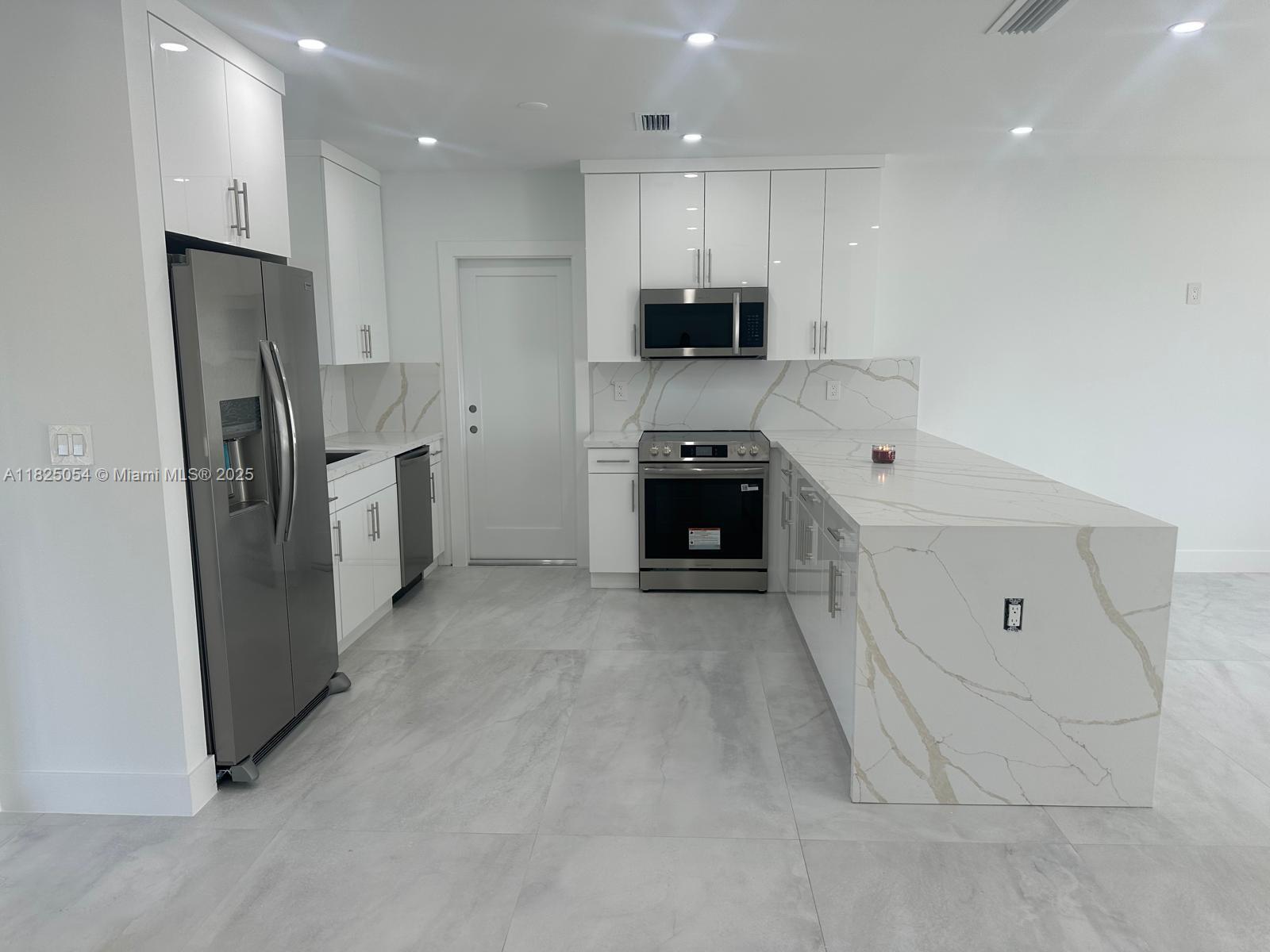 771 NW 15th St