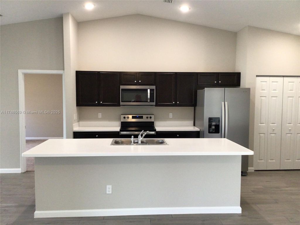 Photo of 1179 SW Colorado Ave #1179, Port Saint Lucie, FL 34953 (MLS # A11748569)