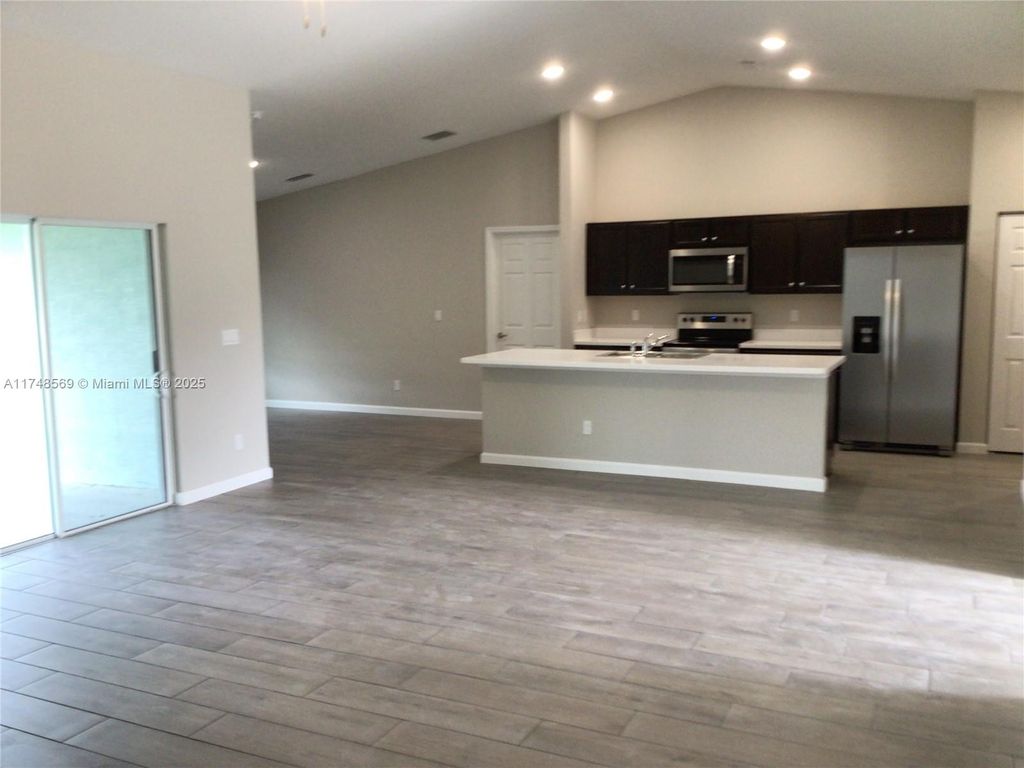 Photo of 1179 SW Colorado Ave #1179, Port Saint Lucie, FL 34953 (MLS # A11748569)