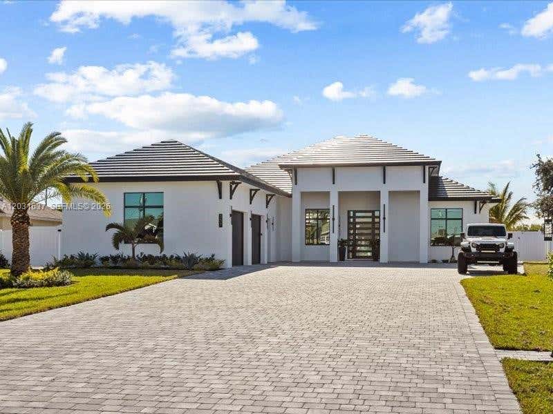 Photo of 337 SW Kestor Dr, Port St Lucie, FL 34953 (MLS # A12031637)
