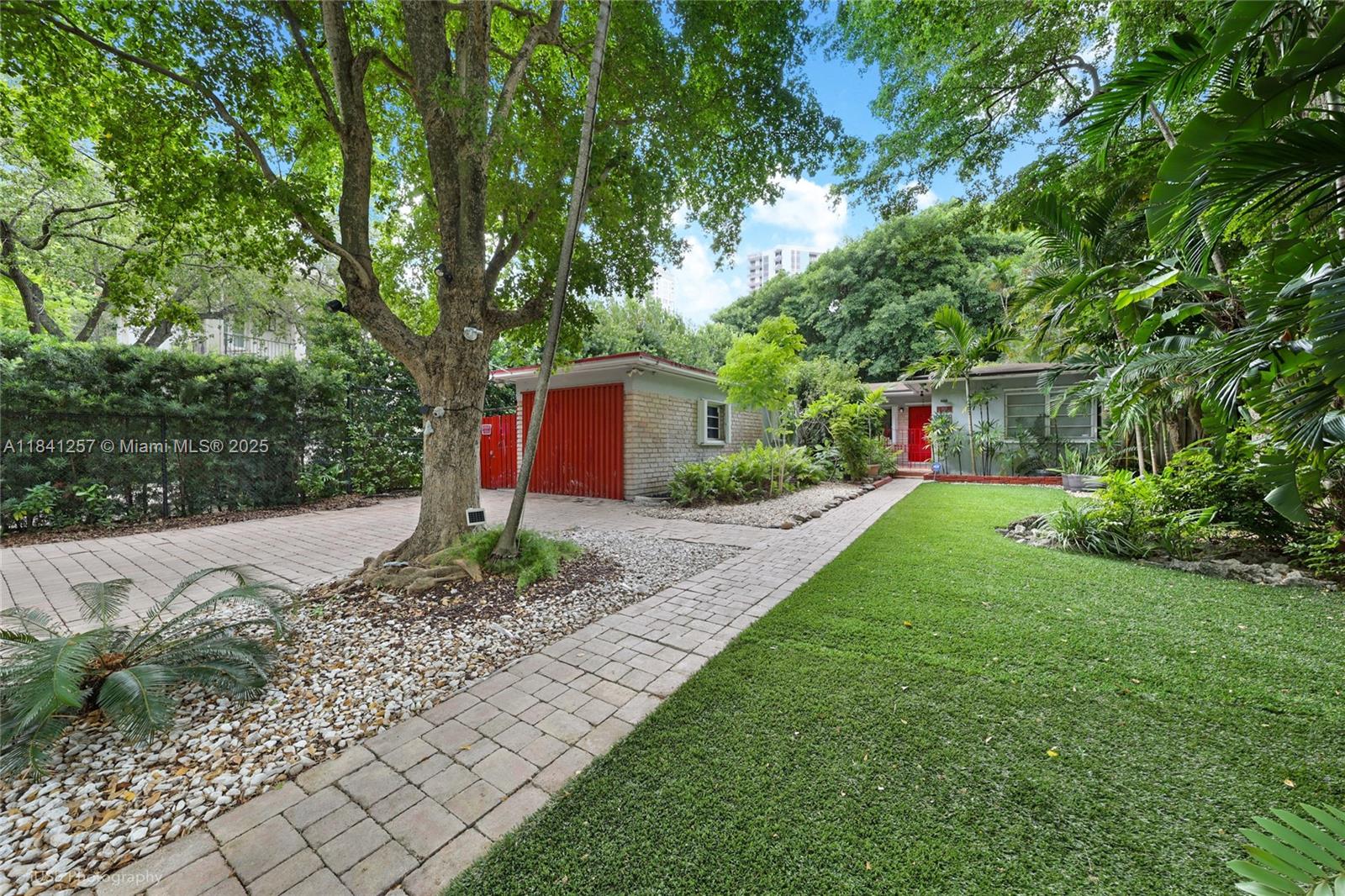 Discover this unique opportunity to own property in one of Miami’s most desirable neighborhoods, just minutes from the vibrant heart of Brickell. Zoned T3-R under Miami 21, the property offers excellent flexibility for future redevelopment while retaining value as a single-family home.
Set on a spacious lot, the existing single-story residence features a thoughtful layout and easy flow. The owner's suite was expanded by combining two bedrooms, creating a roomy retreat with added privacy and comfort.
Whether you plan to renovate, redevelop, or hold as an investment, this is a wise choice in a fast-changing area. With its prime location near top dining, entertainment, and transit, as well as strong zoning potential, this opportunity won't last.