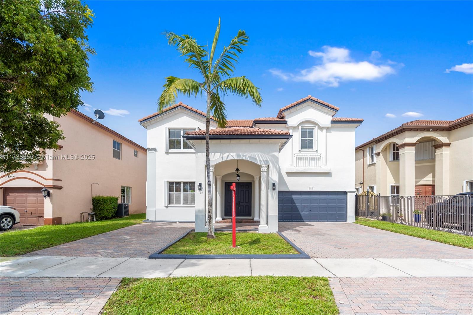 This spectacular home is located in Century Gardens. It has over 3000 square feet, four bedrooms, and four baths with two master suites. There is a large loft upstairs that can be used as a playroom, office, or fifth bedroom. The home has been recently painted inside and out. This home has beautiful marble floors and recently installed luxury vinyl on the second floor. The kitchen has granite countertops and a breakfast area. There is a formal dining room and a large family room. The home has wood blinds, huge walk-in closets, and a two-car garage. The paved driveway can accommodate up to eight cars. Accordion shutters throughout the home. There is NO ASSOCIATION. The home is in a great location, near A+ schools, expressways, restaurants, and shops.