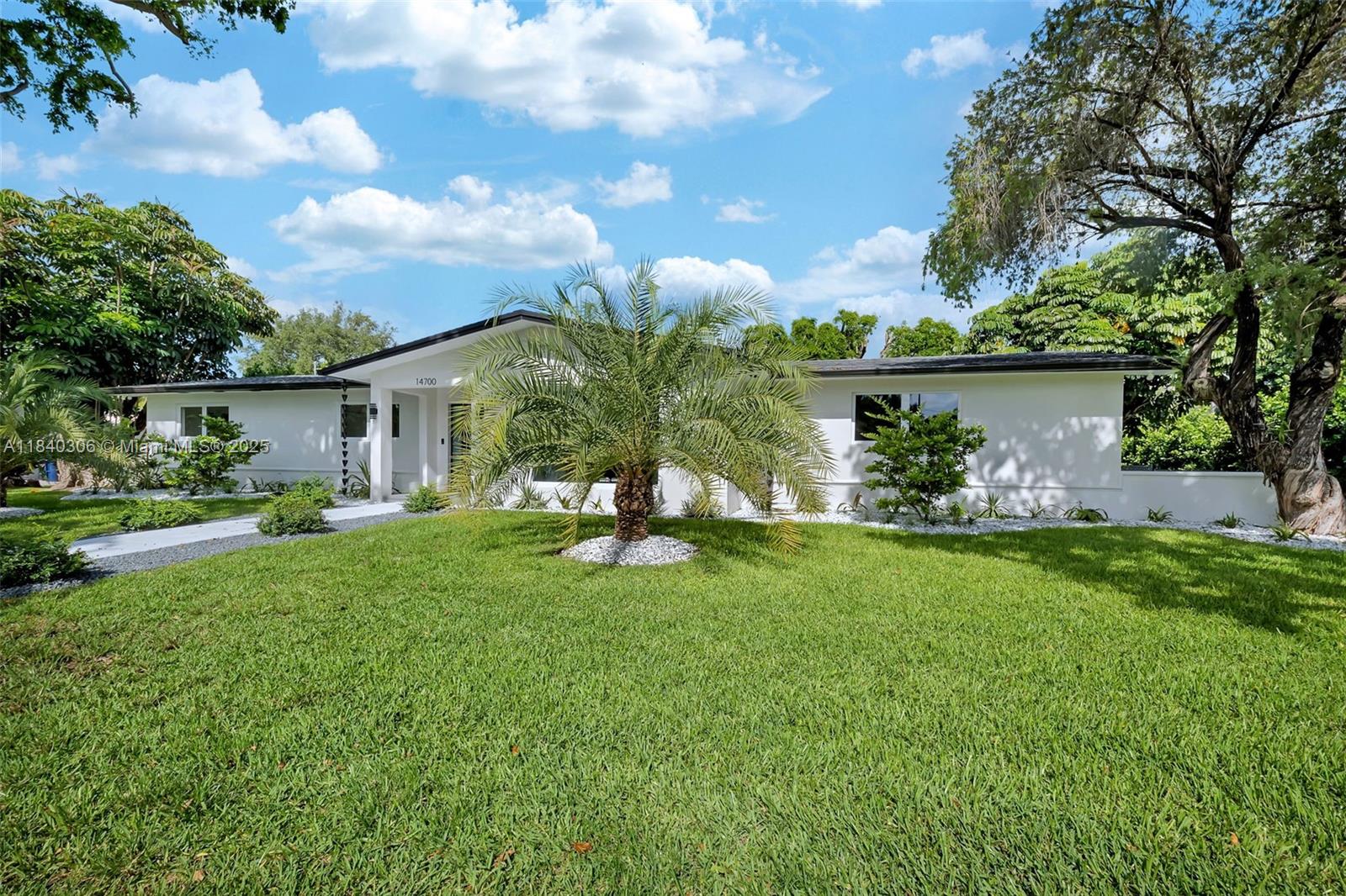 Fabulous, newly remodeled 4 bdrm/ 2 bath home in the incomparable community of Mangowood in North Palmetto Bay. Upgrades include new impact windows/ doors, electrical panel, flat roof, tile & vinyl flooring. Open concept floor plan w/ living area, dining area & beautiful Chef’s kitchen w/ Viking appliances, quartz countertops & white cabinetry, eat-in snack bar. Lovely fenced backyard w/ swimming pool, sprawling lawn, covered patio & space for your summer kitchen. 2.5 car garage w/ AC, and plenty of storage space. Plus room to park the boat!