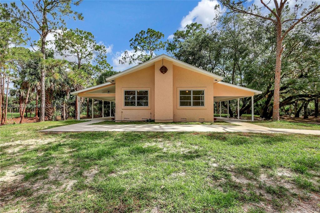 Photo of 26091 SW 95th St, Indian Town, FL 34956 (MLS # A11602017)