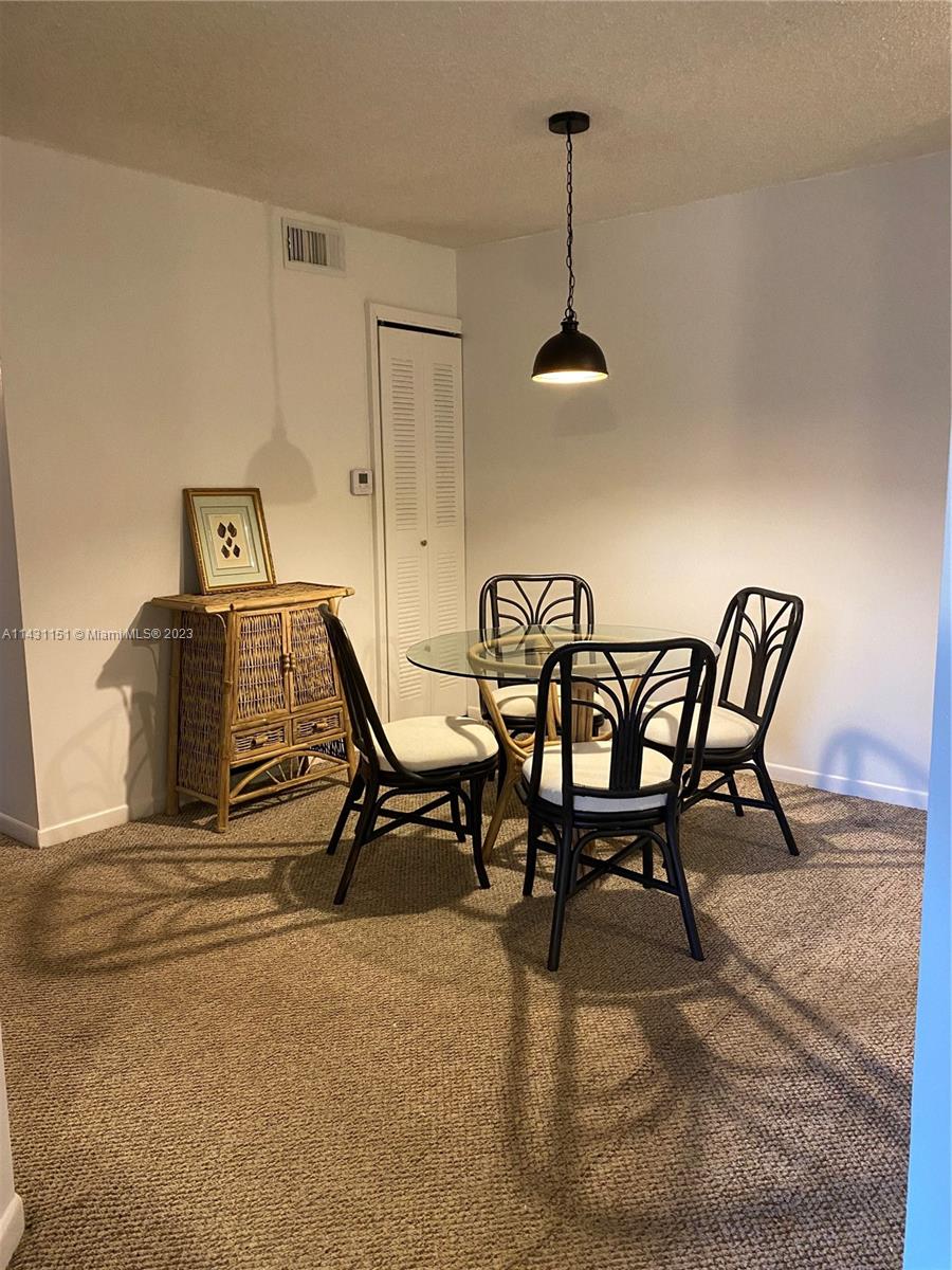 Photo of 1715 Village Blvd #203, West Palm Beach, FL 33409 (MLS # A11431151)