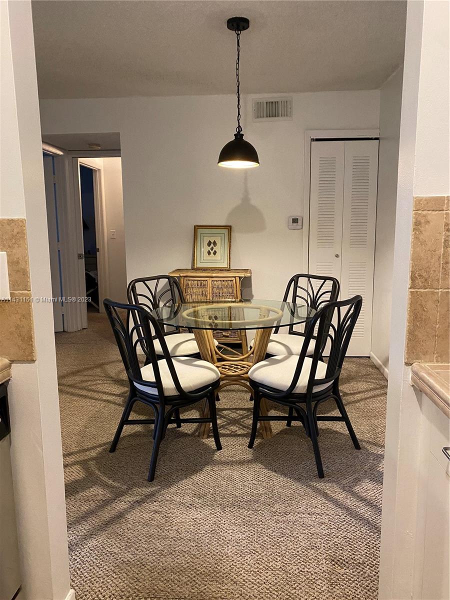 Photo of 1715 Village Blvd #203, West Palm Beach, FL 33409 (MLS # A11431151)