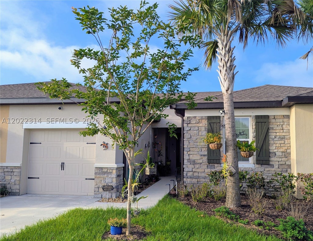 Photo of 5103 Joyous Pl, Fort Pierce, FL 34947 (MLS # A12022314)