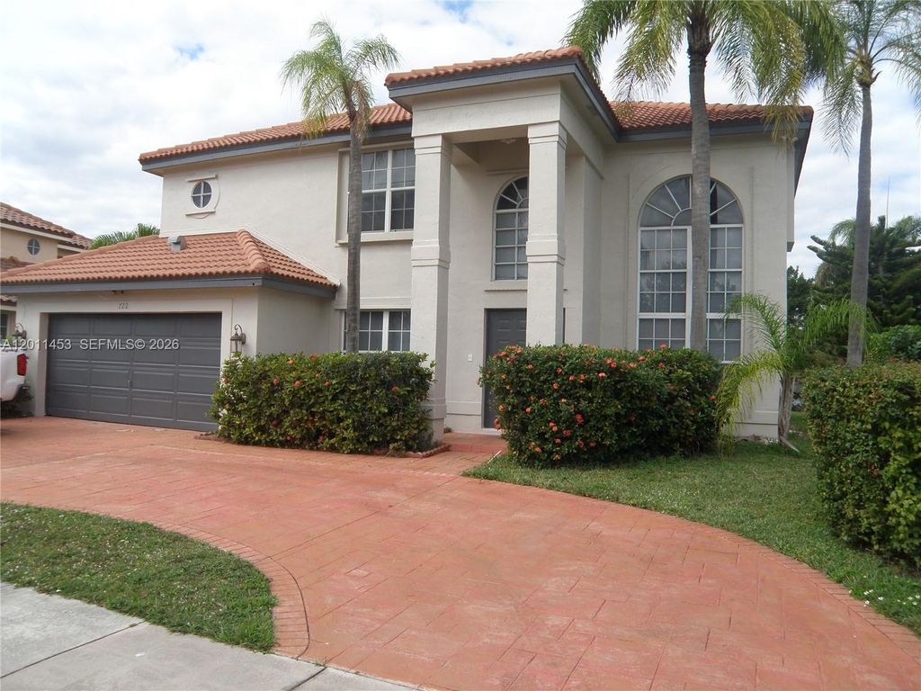 Photo of 722 NW 177th Ave, Pembroke Pines, FL 33029 (MLS # A12011453)