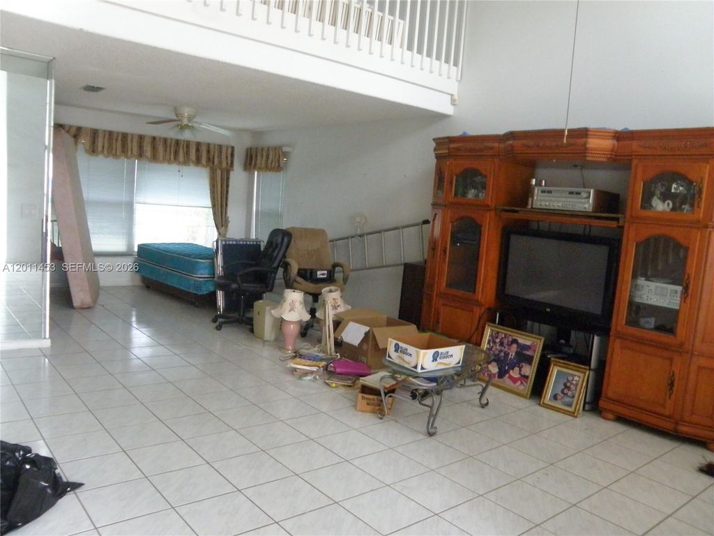 Photo of 722 NW 177th Ave, Pembroke Pines, FL 33029 (MLS # A12011453)