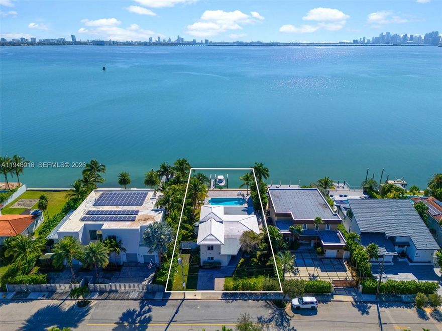 Experience wide, unobstructed, and extraordinary panoramic open-bay views of both the Miami and Miami Beach skylines from this exceptional waterfront residence in North Bay Village. Ideally positioned on ultra-prestigious South Treasure Drive, this property offers what discerning buyers and boaters value most: true direct ocean access — with no fixed bridges.
The 4-bedroom, 3-bath home sits on a 10,500 SF lot with approximately 70 feet of direct bay frontage, a seawall (2018), new roof, and exceptional redevelopment potential. Boating enthusiasts will appreciate the two boat lifts (20,000-lb and 12,000-lb, currently rented) and immediate access to Biscayne Bay and the open ocean.
Surrounded by trophy waterfront estates and ongoing luxury redevelopment, inventory along this water line is increasingly rare. Whether enjoyed as-is or reimagined into a custom waterfront estate, the property delivers unforgettable sunsets, 180-degree unobstructed water vistas, and a lifestyle defined by views, access, and exclusivity.
Just minutes from Miami Beach, Downtown Miami, and blocks from Normandy Shores Golf Course, this is a prime opportunity to secure a premier waterfront position in one of Miami’s fastest-rising island neighborhoods.
A rare offering. A lasting investment. Your slice of paradise awaits.