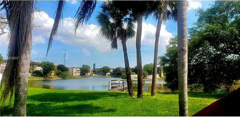 Photo of 5498 NW 11th St #C, Plantation, FL 33313 (MLS # A12023007)