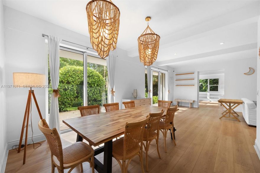 A rare ground-floor 4BR/3BA with a sprawling private lawn, beach access, & the feel of a private home. With more garden space than any house in Key Biscayne, it’s a dream for families, pet owners & outdoor entertaining. This is the only unit of its kind on the island & the largest in the building (2,710 SF), expanded through a private extension & merged cabana. Brand-new hardwood floors & 2 spa-like renovated bathrooms. 2 oversized living areas make it ideal for hosting. Floor-to-ceiling windows & tall ceilings fill the home w/bright natural light. The open kitchen & dining area flow seamlessly into indoor & outdoor spaces, capturing the breezy charm of a beach house. 1 bedroom includes a kitchenette, perfect for guests. Steps from the pool & beach, short walk to town. A unique sanctuary.