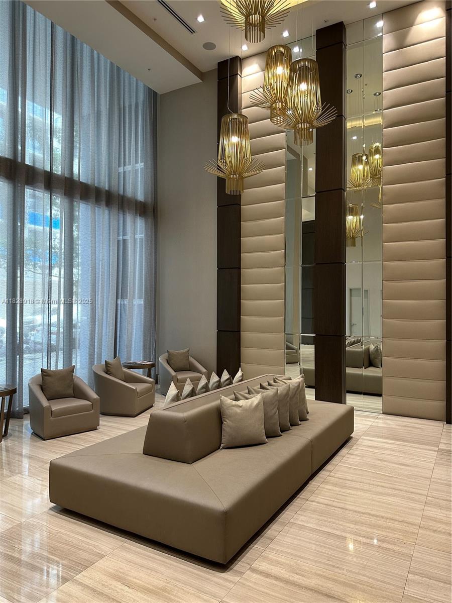 Experience elevated living in this exclusive Brickell penthouse, available for purchase. Featuring two assigned covered parking spaces, 3 spacious bedrooms, and 3.5 bathrooms, this residence offers breathtaking panoramic views of Biscayne Bay and the Miami skyline through floor-to-ceiling windows and soaring 12-foot ceilings. The custom-designed kitchen features Italian cabinetry, quartz countertops, and top-of-the-line Bosch appliances. Residents enjoy luxury amenities including a rooftop terrace with a decorative reflecting pool, jacuzzi spa, fitness center, and rooftop lounge. Additional amenities include a swimming pool, BBQ area, kids’ playroom, and business center. Ideally located just a few blocks from Brickell City Centre, offering world-class shopping, dining, and entertainment.