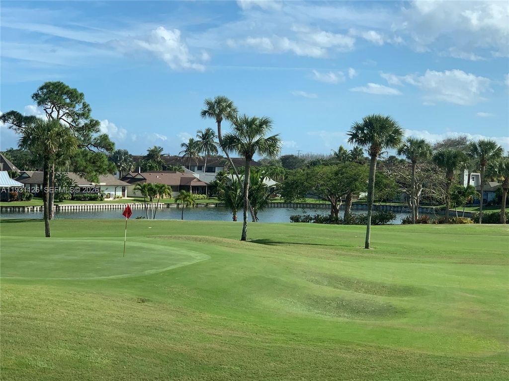 Photo of 5463 SE Miles Grant Rd #210, Stuart, FL 34997 (MLS # A11931126)