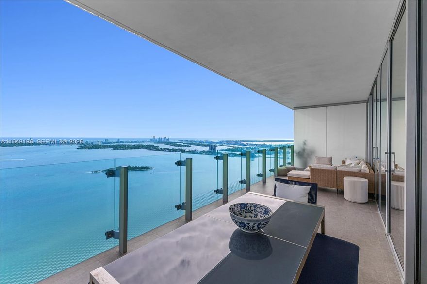 Perched on the 47th floor, this exceptional 3-bedroom, 4.5-bath residence offers 2,586 square feet of refined living with breathtaking, unobstructed views of Biscayne Bay and the Atlantic Ocean.

Designed for both elegance and comfort, the residence features a spacious, light-filled layout with floor-to-ceiling glass that frames sunrise over the bay and sunset over the Miami skyline. Expansive living and dining areas flow seamlessly, creating an ideal setting for both everyday living and entertaining at scale. Each bedroom offers ensuite baths and privacy, while the primary suite delivers a true retreat in the sky.

Located in a high-rise building with a boutique feel, residents enjoy an elevated lifestyle with resort-style amenities, including sunrise and sunset pools, tennis court, state-of-the-art fitness center, and thoughtfully curated common spaces designed for wellness and leisure.

Ideally situated in Edgewater, just minutes from the Design District, Wynwood, Downtown Miami, and Miami Beach, this residence represents a rare opportunity to own a high-floor home combining panoramic views, generous scale, and refined amenities.

Offered at $3,350,000.
Private showings by appointment.