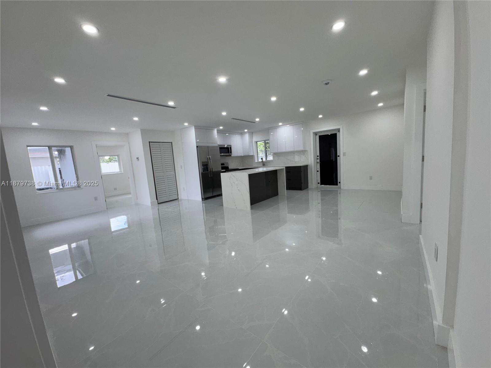 Beautifully remodeled home featuring impact windows, 4 spacious bedrooms, and 3 modern bathrooms. The open-concept kitchen and the expansive backyard make this property perfect for entertaining and family living.
