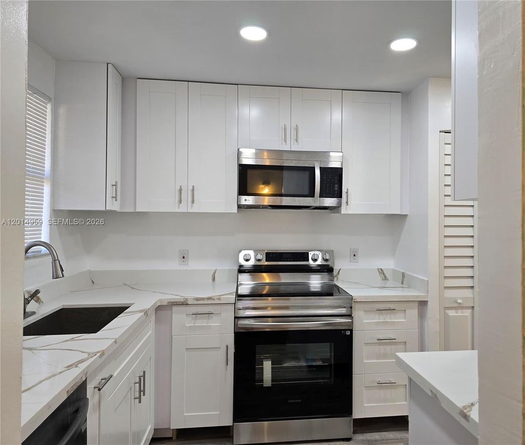 Photo of 11477 NW 39th Ct #205-1, Coral Springs, FL 33065 (MLS # A12014959)