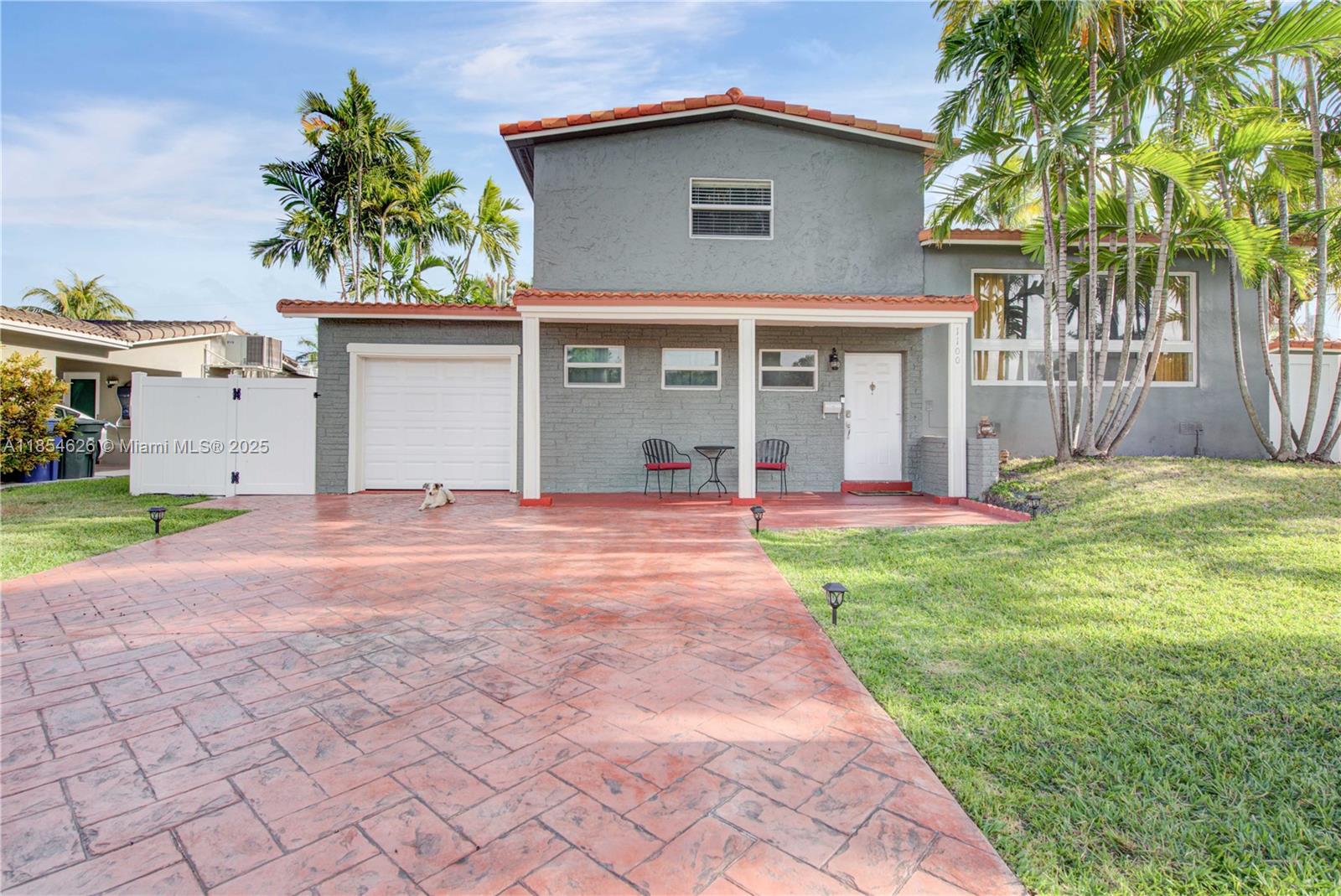 Welcome home to this lovely 2-story single-family home on an oversized 7,407 SF lot. Located in Hallandale Beach's most coveted area, the home is close distance to parks, schools, shopping centers, and the beaches. There are 2 bedrooms on the entrance level with a full bathroom, and an attached garage, then go up a few stairs to find a beautiful open concept kitchen with an island, a spacious living area, and a family room with large windows and lots of light. Upstairs you will find the oversized master suite with a walk in closet with a barn door and a full bathroom w/ 2 sinks/mirrors, tub and custom shower. Impact windows throughout, and a nice backyard, in a very quiet neighborhood.