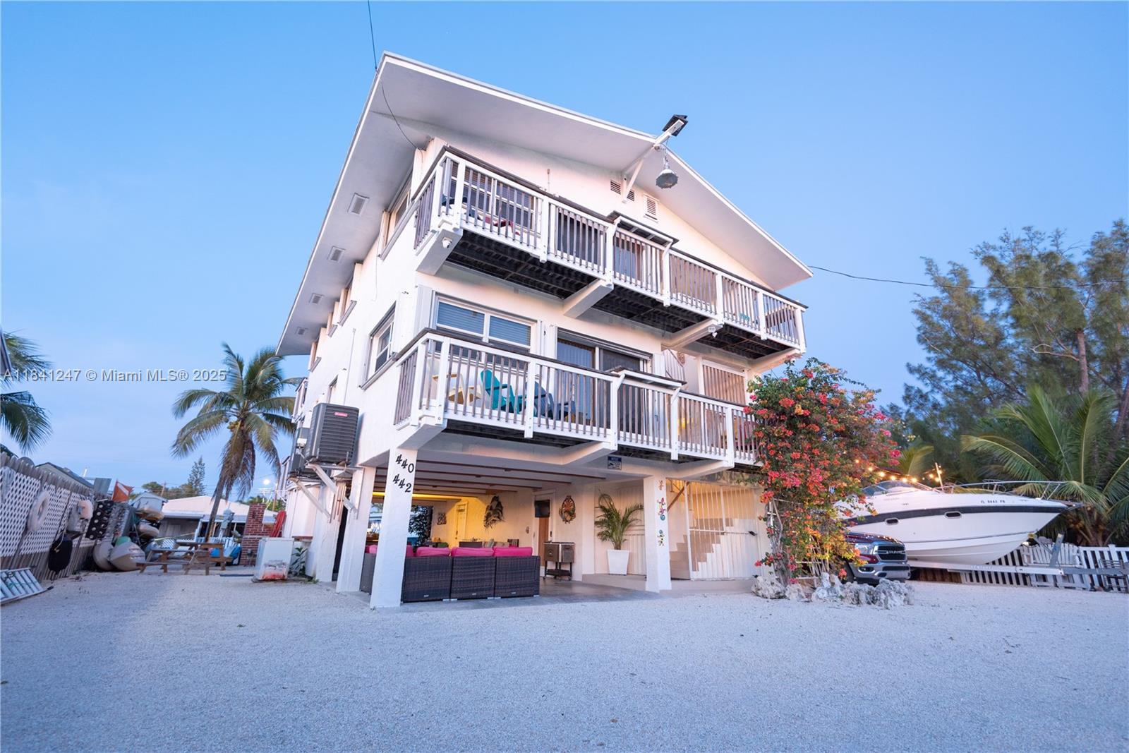 Stunning duplex on a generous 7,500 square foot lot with 75 feet of dock/sea wall. Each unit has 3 bedrooms and 2 bathrooms. Enjoy the Florida lifestyle with an above ground pool and fully fenced yard, ideal for entertaining. Short term rentals possible with the appropriate license. Live in one unit and receive rental income from the other, keep it as a duplex investment, or convert it into a single-family home facing deep water canal with no bridges. Strong rental market. Both units offer spacious layouts, ample parking, and separate utilities. The property's canal front location offers excellent access to the ocean/bay with minimal time. Very well protected with boot key harbor. The owner is a real estate agent