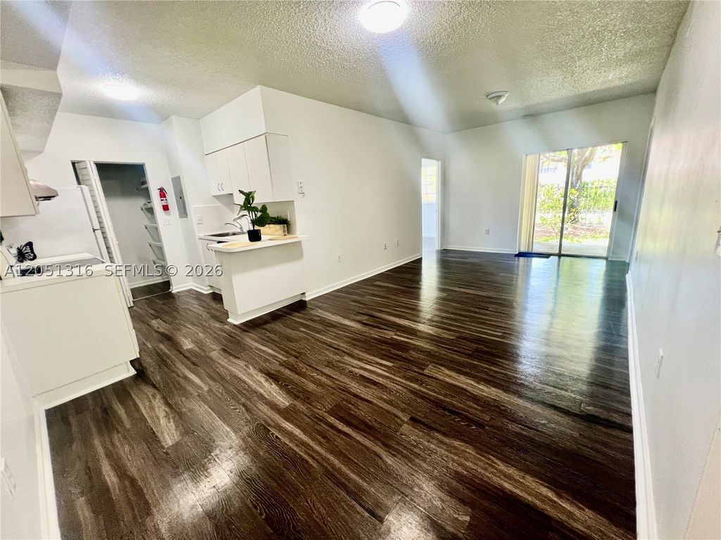 Photo of 3211 Sabal Palm Mnr #102, Davie, FL 33024 (MLS # A12051316)