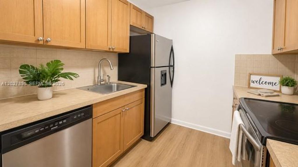 Photo of 13300 SW 1st St #106O, Pembroke Pines, FL 33027 (MLS # A12027895)