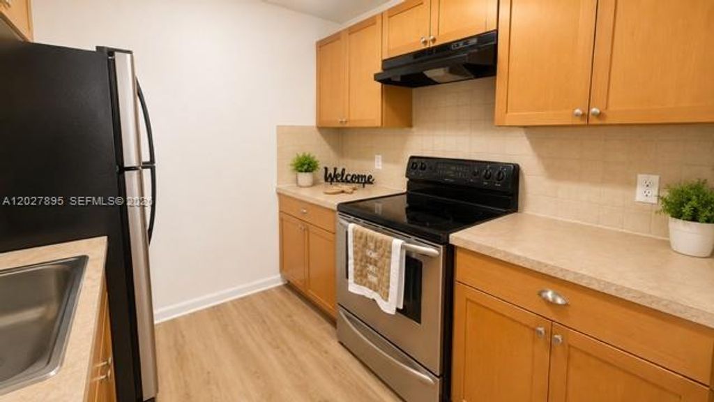Photo of 13300 SW 1st St #106O, Pembroke Pines, FL 33027 (MLS # A12027895)
